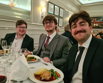 3 young men enjoying the dinner